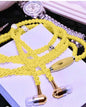 Auricular con collar de perlas
